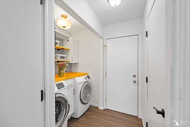 773 Hunting Creek Rd, Temperance, MI 48182 - washroom with cabinet space, wood finished floors, separate washer and dryer, and baseboards