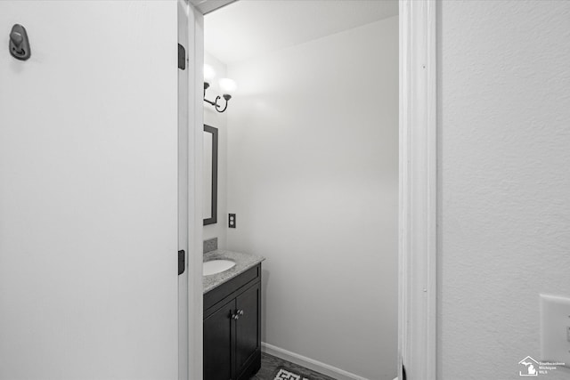 773 Hunting Creek Rd, Temperance, MI 48182 - bathroom featuring vanity and baseboards