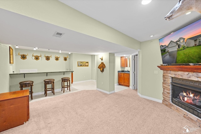 773 Hunting Creek Rd, Temperance, MI 48182 - living area featuring light colored carpet, baseboards, and a fireplace