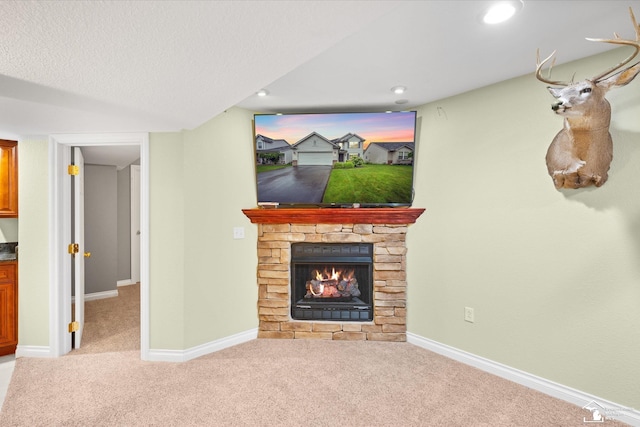 773 Hunting Creek Rd, Temperance, MI 48182 - unfurnished living room with carpet, a stone fireplace, baseboards, and recessed lighting