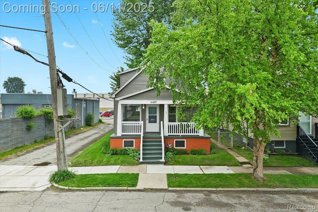 4469 5th St, Ecorse, MI 48229 - view of front of property featuring stairway and a porch