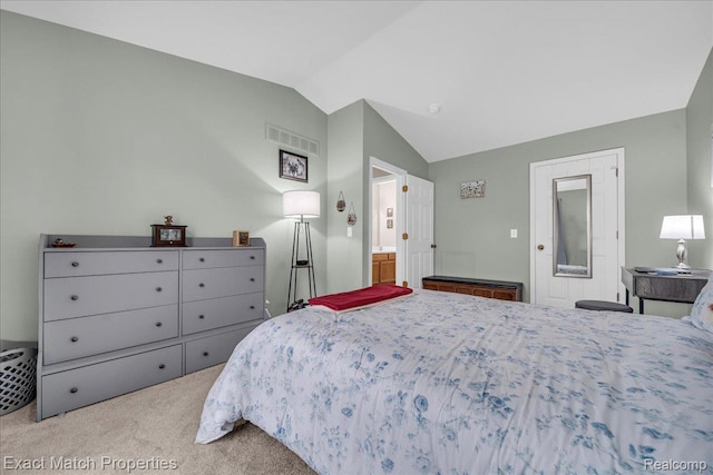 140 Pine Tree Ridge Dr Unit 2, Waterford, MI 48327 - carpeted bedroom with lofted ceiling and ensuite bath