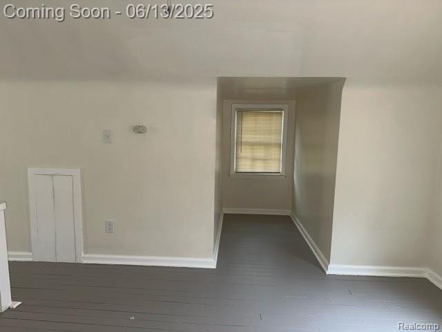 19628 Elkhart St, Harper Woods, MI 48225 - unfurnished room featuring baseboards and dark wood-style floors