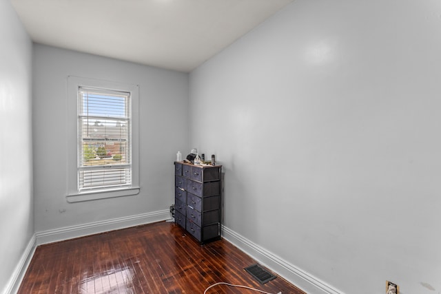 9213 Conant, Hamtramck, MI 48212 - unfurnished bedroom with dark wood-style flooring and baseboards