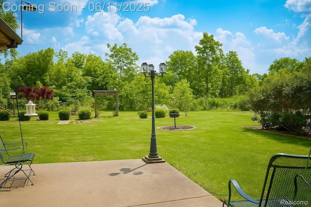 3161 Eastgate St, Burton, MI 48519 - view of green lawn featuring a patio