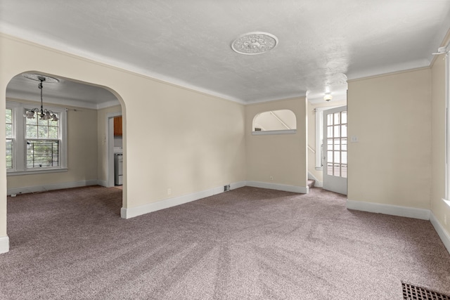 11414 Manor, Detroit, MI 48204 - empty room featuring a chandelier, carpet flooring, arched walkways, ornamental molding, and baseboards