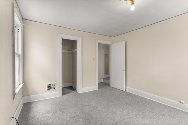 11414 Manor, Detroit, MI 48204 - unfurnished bedroom featuring carpet flooring, baseboards, and a closet