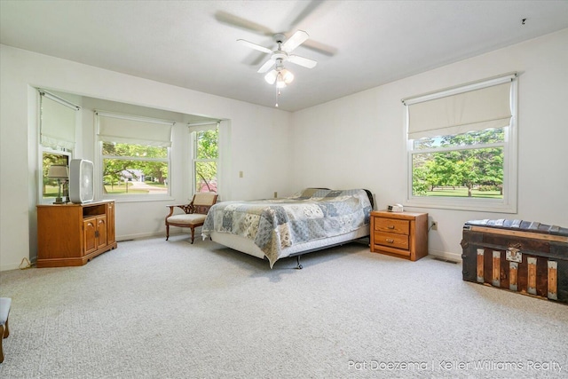 376 Stauffer Dr, Hastings, MI 49058 - carpeted bedroom with baseboards and ceiling fan