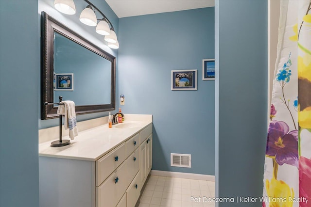 376 Stauffer Dr, Hastings, MI 49058 - bathroom featuring vanity and baseboards