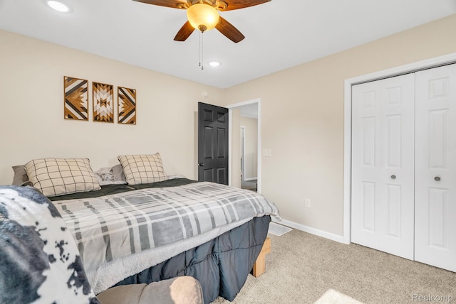 5668 Mill St, Peck, MI 48466 - bedroom featuring a closet, light carpet, recessed lighting, baseboards, and ceiling fan