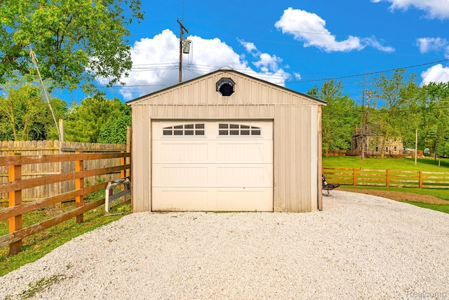 5668 Mill St, Peck, MI 48466 - detached garage featuring gravel driveway