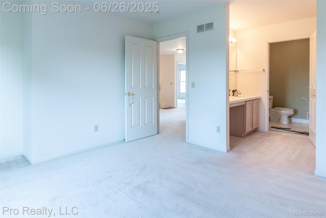 4233 Holly Ln, Rochester, MI 48306 - unfurnished bedroom with light carpet and ensuite bathroom