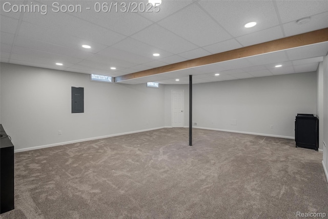 18885 English Ivy Dr, Macomb, MI 48042 - finished below grade area with carpet floors, electric panel, a paneled ceiling, baseboards, and recessed lighting