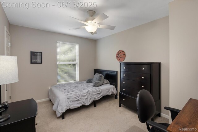 18885 English Ivy Dr, Macomb, MI 48042 - bedroom featuring light colored carpet, a desk, baseboards, and ceiling fan