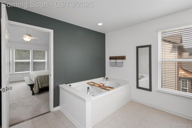 18885 English Ivy Dr, Macomb, MI 48042 - ensuite bathroom featuring a garden tub, baseboards, recessed lighting, and a ceiling fan