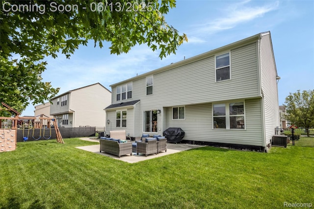 18885 English Ivy Dr, Macomb, MI 48042 - rear view of house featuring an outdoor living space, a patio area, cooling unit, and a playground