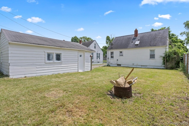 337 Burroughs Ave, Flint, MI 48507 - back of property with a chimney