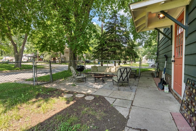 819 N Ball St, Owosso, MI 48867 - view of patio with a gate and an outdoor living space