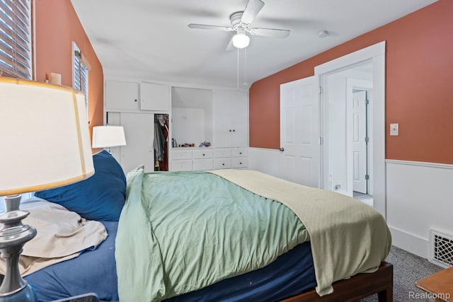 819 N Ball St, Owosso, MI 48867 - carpeted bedroom featuring a closet and ceiling fan