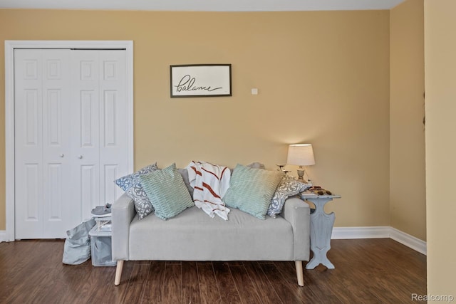 819 N Ball St, Owosso, MI 48867 - living area with baseboards and wood finished floors