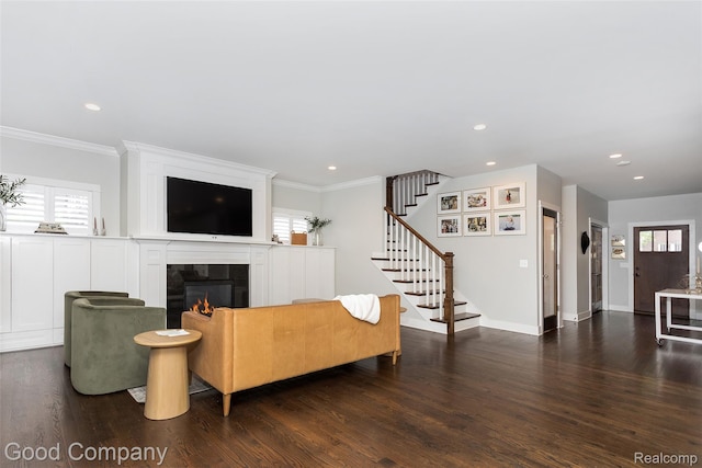 1017 N Maple Ave, Royal Oak, MI 48067 - living area with stairs, wood finished floors, crown molding, recessed lighting, and a tiled fireplace