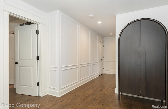 1017 N Maple Ave, Royal Oak, MI 48067 - hall featuring dark wood-style floors, recessed lighting, and a decorative wall