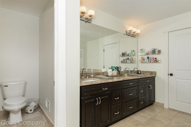1017 N Maple Ave, Royal Oak, MI 48067 - full bath featuring double vanity, tile patterned flooring, and toilet
