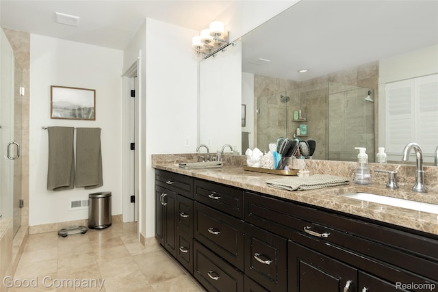 1017 N Maple Ave, Royal Oak, MI 48067 - full bathroom with double vanity, a shower stall, and baseboards