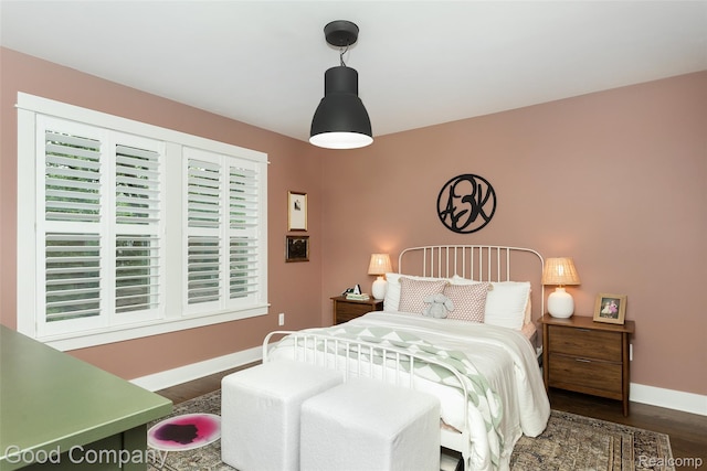 1017 N Maple Ave, Royal Oak, MI 48067 - bedroom with baseboards and wood finished floors