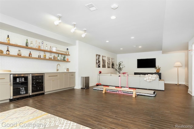 1017 N Maple Ave, Royal Oak, MI 48067 - indoor wet bar featuring beverage cooler, recessed lighting, dark wood-type flooring, and baseboards