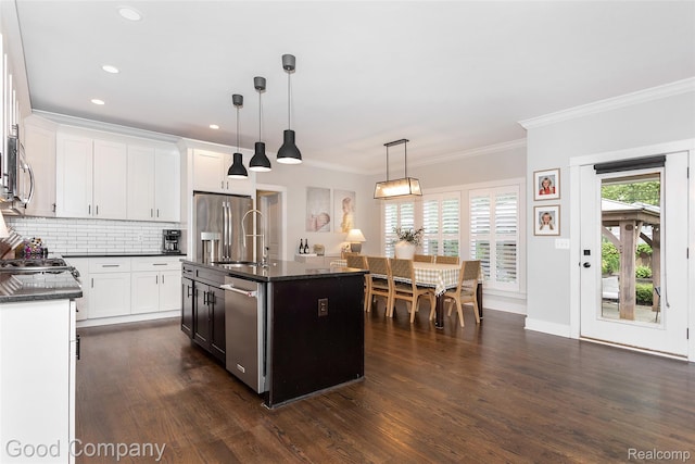 1017 N Maple Ave, Royal Oak, MI 48067 - kitchen with appliances with stainless steel finishes, dark wood-style flooring, a sink, tasteful backsplash, and ornamental molding