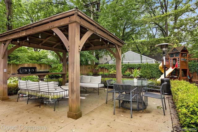 1017 N Maple Ave, Royal Oak, MI 48067 - fenced backyard featuring a gazebo, a playground, a patio area, an outdoor living space, and outdoor dining space