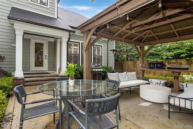 1017 N Maple Ave, Royal Oak, MI 48067 - view of patio featuring a grill, a gazebo, outdoor dining space, and outdoor lounge area