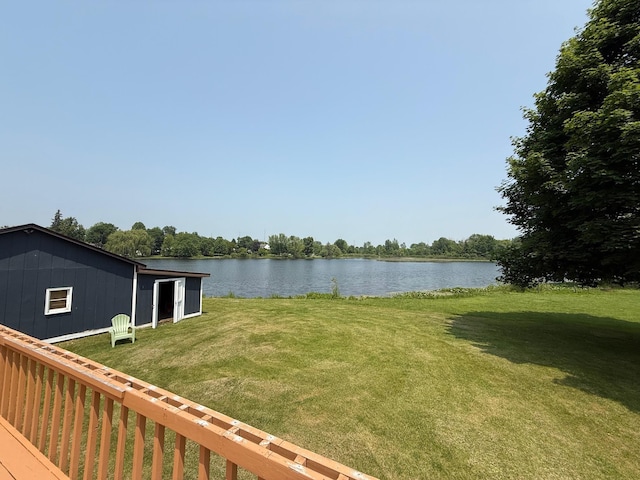 303 S Lemen St, Fenton, MI 48430 - view of grassy yard featuring a water view