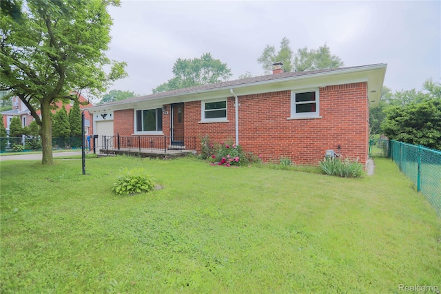 3581 Stolzenfeld Ave, Warren, MI 48091 - ranch-style home with an attached garage, a chimney, and brick siding