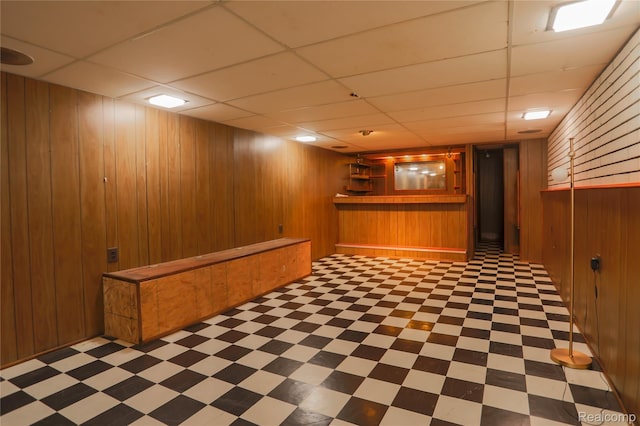 3581 Stolzenfeld Ave, Warren, MI 48091 - indoor dry bar featuring tile patterned floors, wood walls, and a paneled ceiling