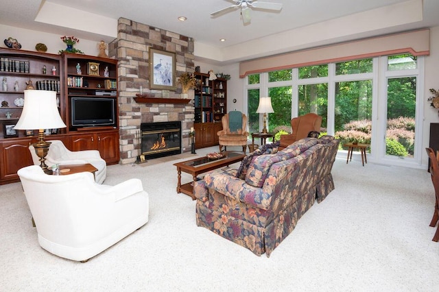 1480 Nelson Rd, Saint Joseph, MI 49085 - living area with carpet flooring, ceiling fan, a stone fireplace, and recessed lighting