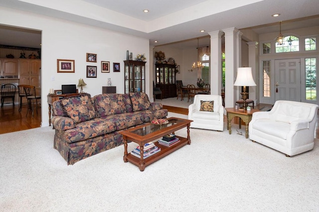 1480 Nelson Rd, Saint Joseph, MI 49085 - carpeted living area with a chandelier, decorative columns, and recessed lighting