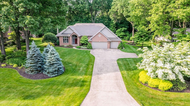 1480 Nelson Rd, Saint Joseph, MI 49085 - view of front of home with driveway, a front lawn, and an attached garage