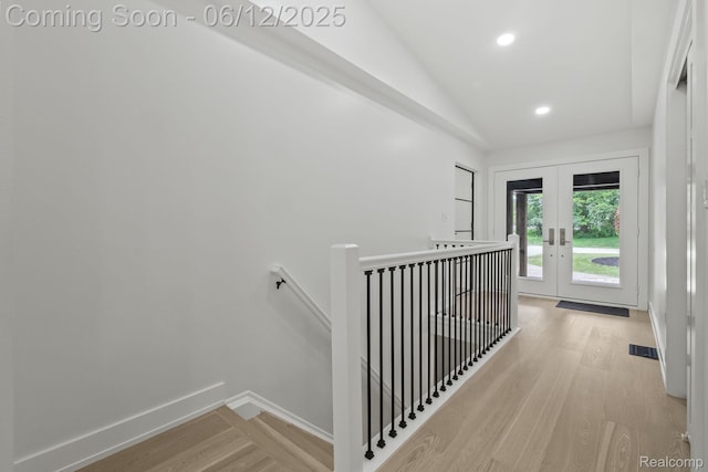3405 Pine Estates Dr, Bloomfield Hills, MI 48323 - hall featuring an upstairs landing, lofted ceiling, french doors, light wood-style floors, and recessed lighting