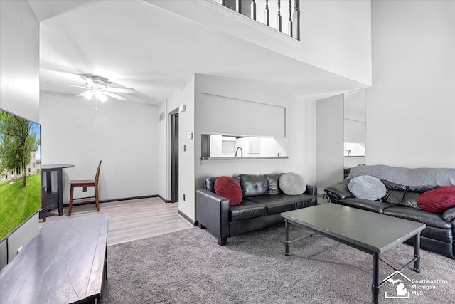 20036 Village Green Ct, Brownstown, MI 48183 - living room featuring a ceiling fan and wood finished floors