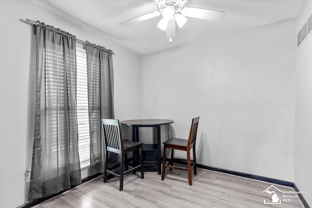 20036 Village Green Ct, Brownstown, MI 48183 - dining area with wood finished floors and ceiling fan