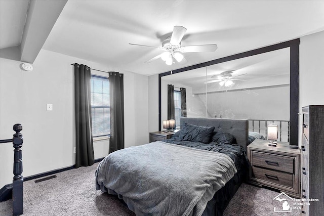 20036 Village Green Ct, Brownstown, MI 48183 - carpeted bedroom with a ceiling fan, beam ceiling, and baseboards