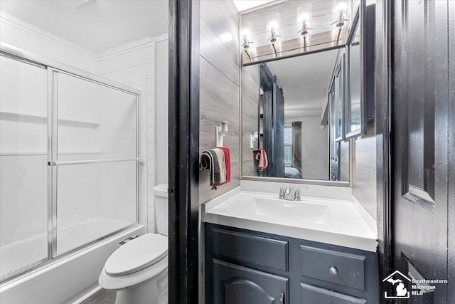 20036 Village Green Ct, Brownstown, MI 48183 - full bath with toilet, vanity, shower / bath combination with glass door, and ornamental molding