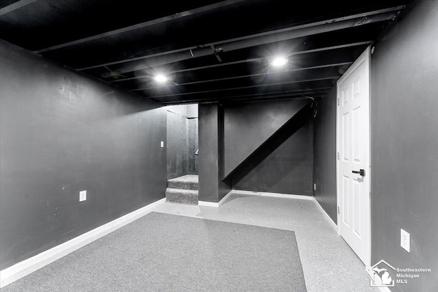 20036 Village Green Ct, Brownstown, MI 48183 - finished basement featuring stairway and baseboards