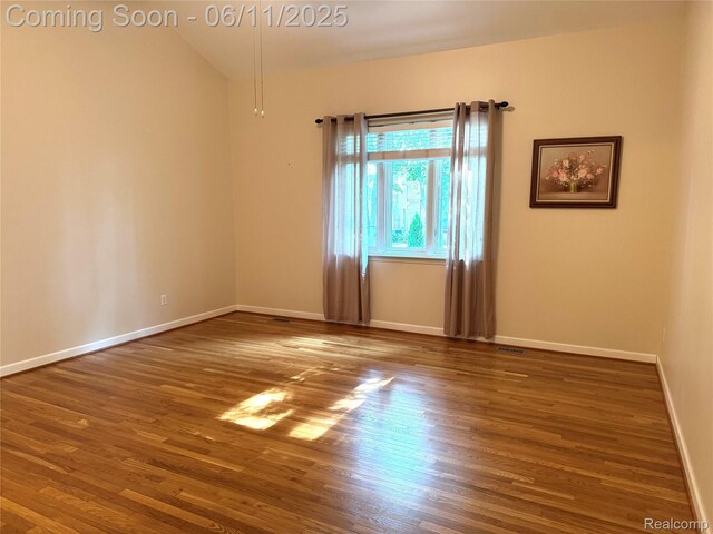 34444 Fargo St, Livonia, MI 48152 - empty room featuring wood finished floors and baseboards