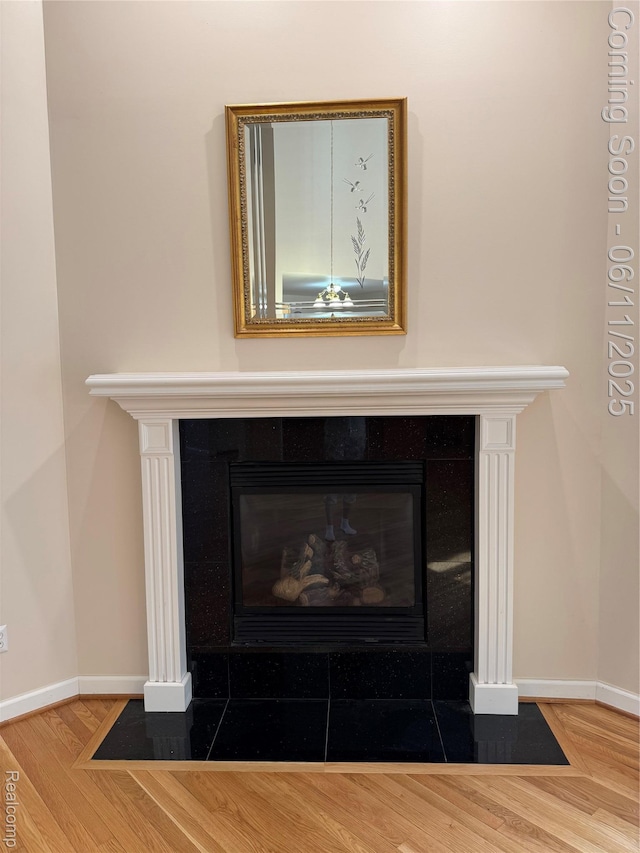 34444 Fargo St, Livonia, MI 48152 - detailed view of a tile fireplace and wood finished floors