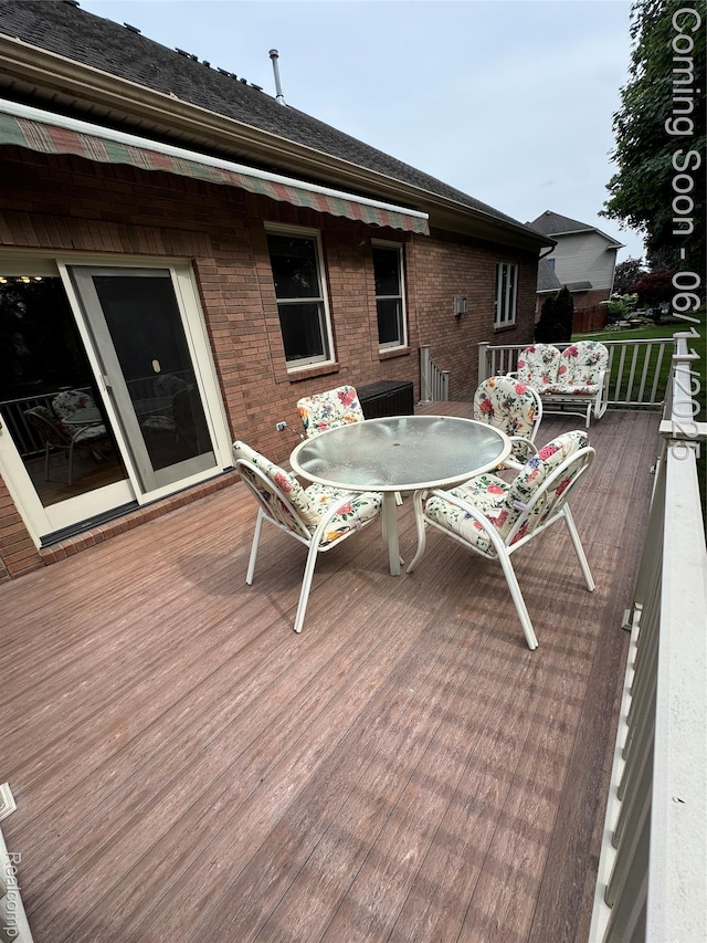 34444 Fargo St, Livonia, MI 48152 - wooden terrace with outdoor dining space