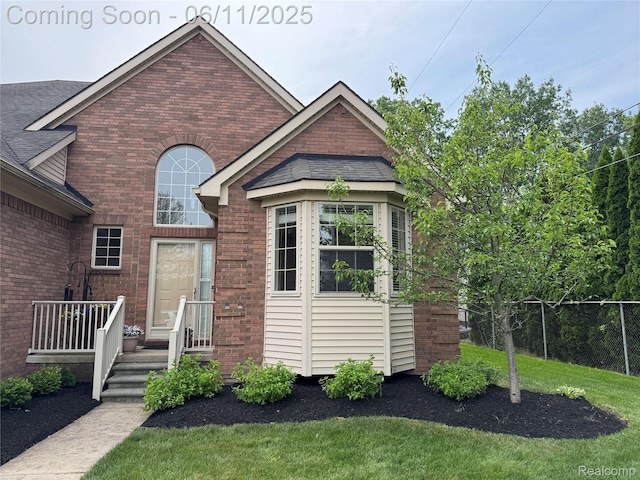 34444 Fargo St, Livonia, MI 48152 - view of front of house featuring brick siding and roof with shingles