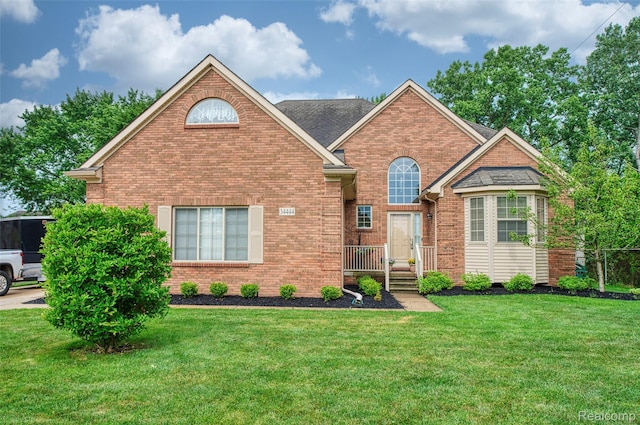 34444 Fargo St, Livonia, MI 48152 - view of front facade featuring brick siding and a front lawn